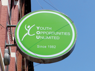 Youth Opportunities Unlimited Since 1982 sign.