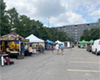 Photo of several vendors at the outdoor Masonville Market