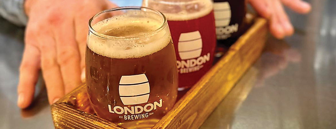 A photo of pints of beer with the London Brewing Co-op logo.