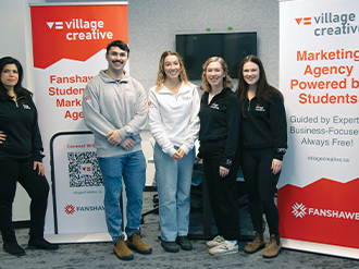 A photo of students and staff at Village Creative in Innovation Village at Fanshawe.