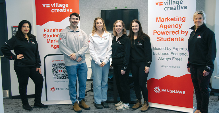 A photo of students and staff at Village Creative in Innovation Village at Fanshawe.